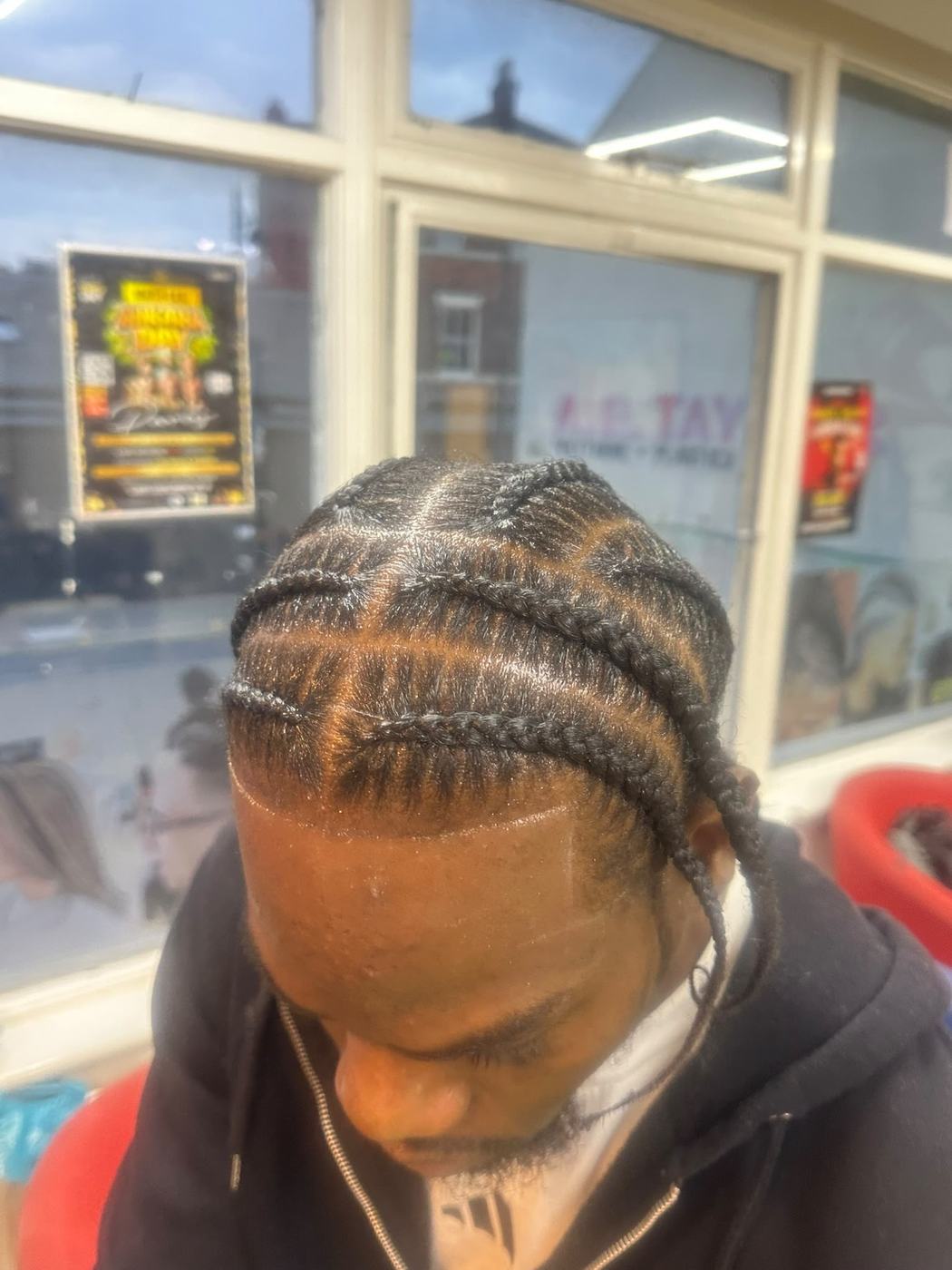 Cross-pattern cornrow braids